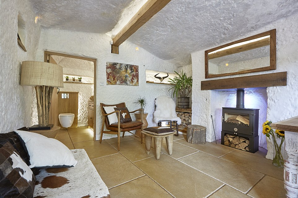 The former head of an Australian recruitment company has returned to underground living by converting a cave in the Wyre Forest, Worcestershire, into his dream home