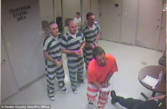 Eight prisoners were behind a locked door on June 23, 2016 in the holding cell of the District Courts Building in Parker County when the officer slumped over after joking with them