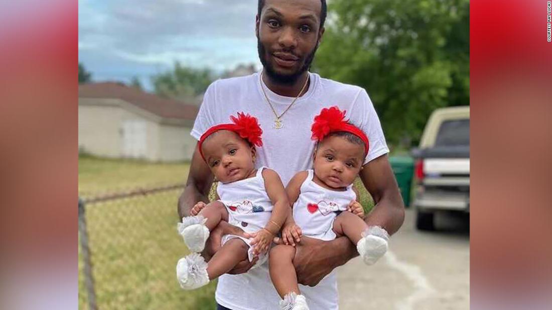 Michigan father rushed into burning home to save his twin 18-month-old  daughters | CNN