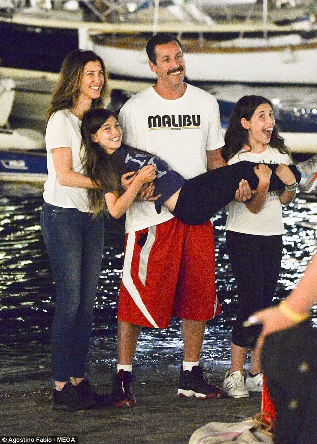Adam Sandler poses for pictures with wife and daughters as they enjoy family vacation in Italy | Daily Mail Online