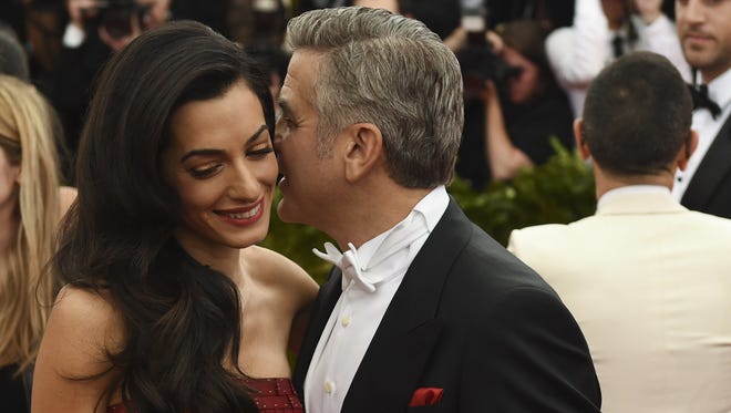 George Clooney and Amal enjoy graveyard strolls