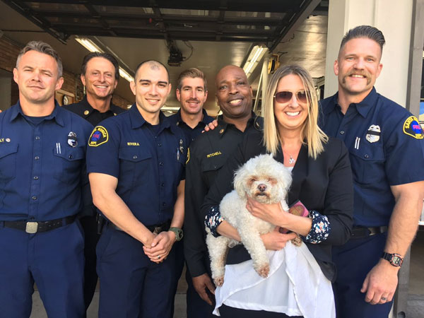 Santa Monica firefighter Andrew Klein reunited with Nalu, the dog he saved using CPR after an apartment fire, as well as Nalu