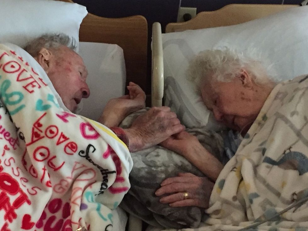man holds dying wife's hand after 77 years of marriage