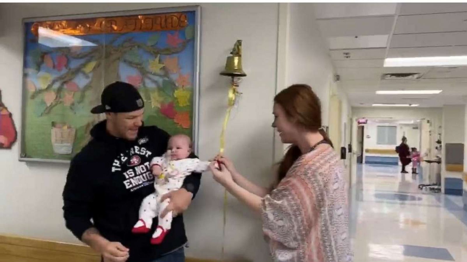 Mom helps baby ring bell after beating brain cancer in emotional video -  Good Morning America